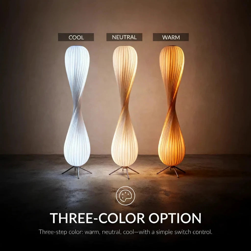 Three modern floor lamps with cool, neutral, and warm light options on a plain background.